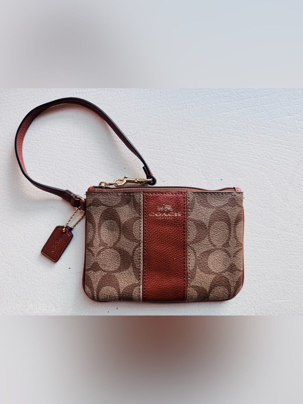 Coach Brown Signature Canvas Wristlet with Rust Accent